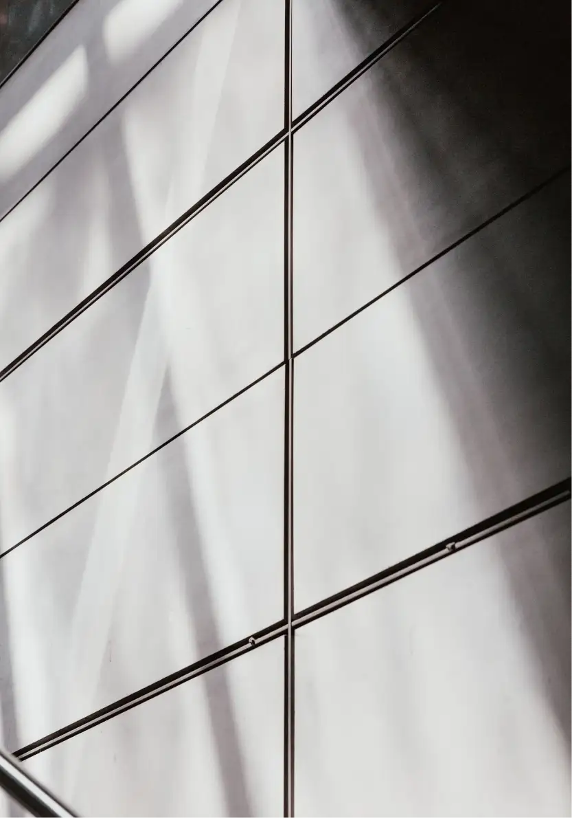 Close up abstract photo of a building wall with dynamic diagonal lines